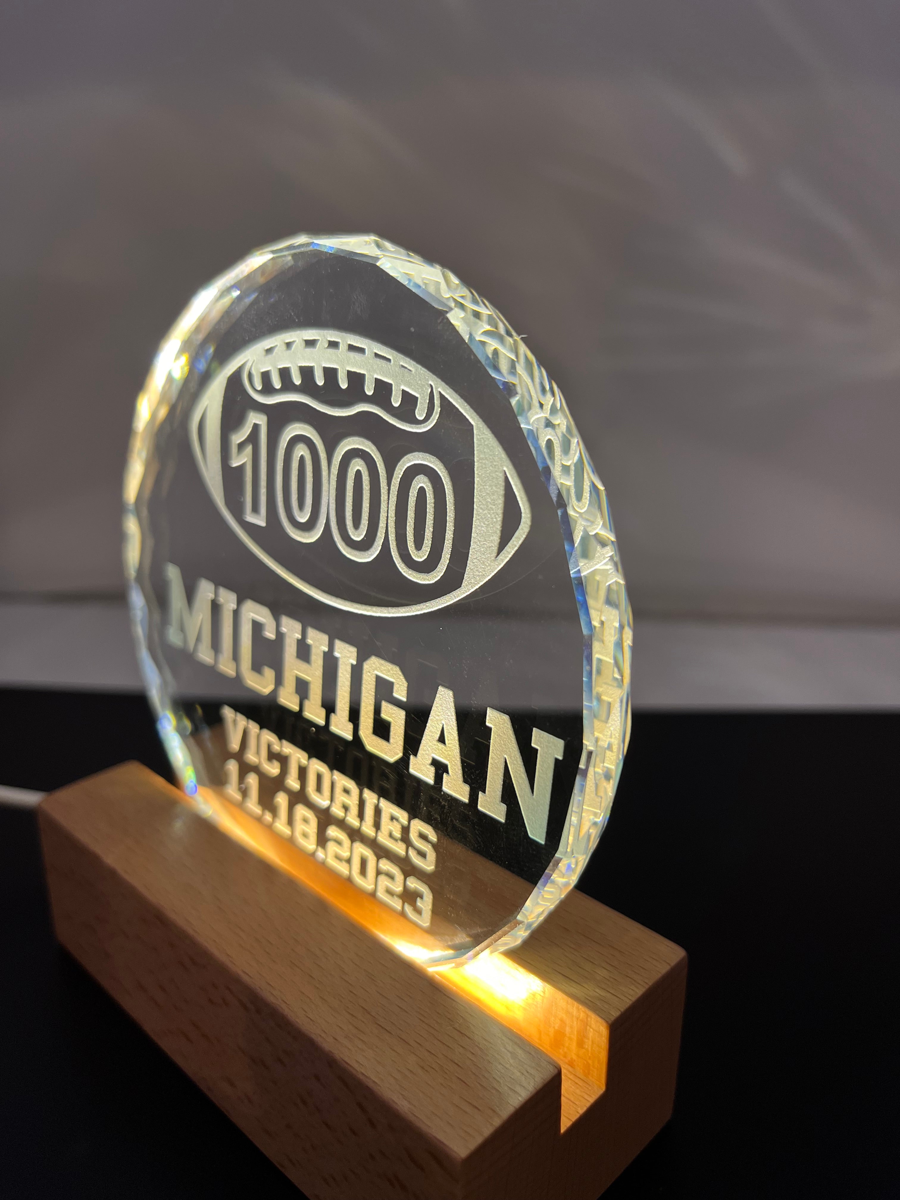 Michigan UM football 1st first to 1000 victories wins crystal lighted base memory celebration