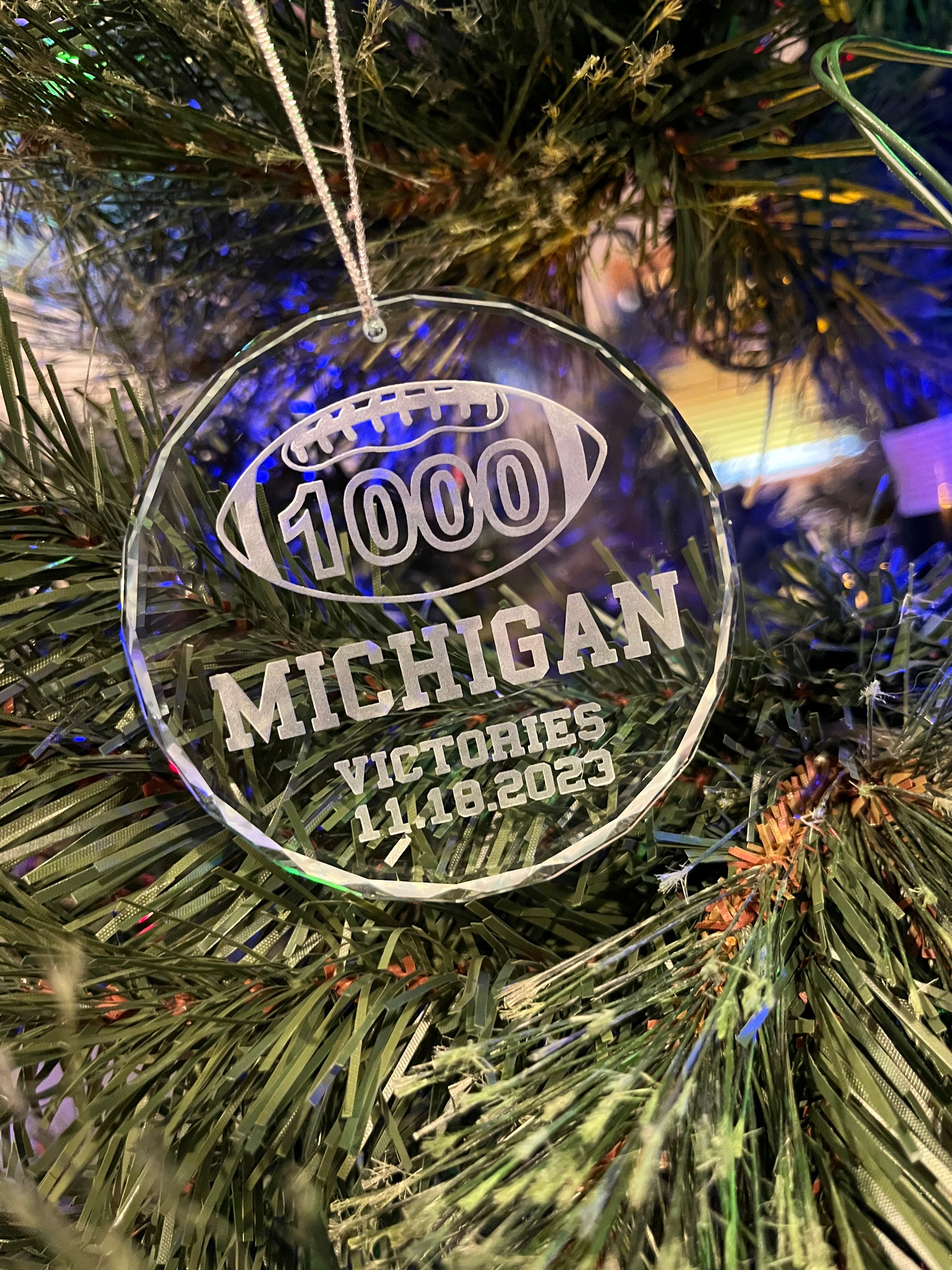 Michigan UM football 1st first to 1000 victories wins crystal ornament memory celebration